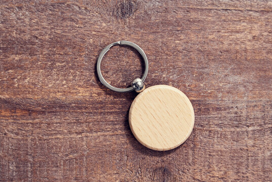 Wooden key chain on wooden background