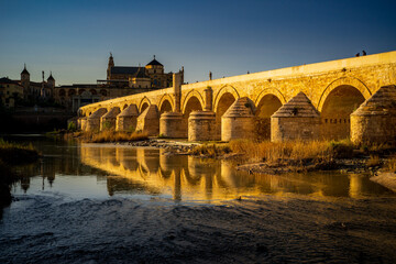 Sunset Over the Roman Bridge on Guadalquivir River in Cordoba, Spain