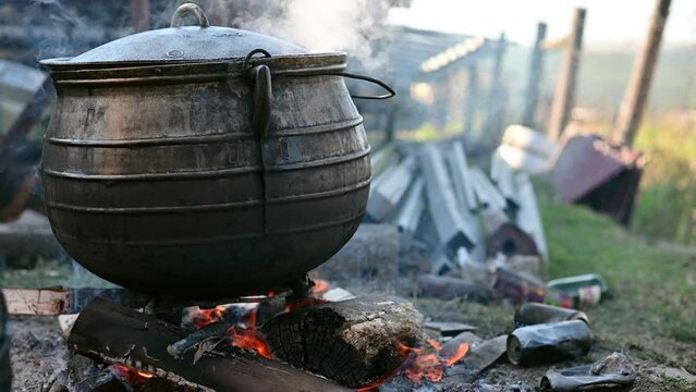 South African traditional potjie kos seen over fire