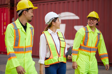 workers walking and talking about work or project in containers warehouse storage