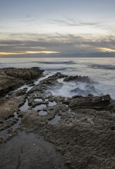 Fototapeta premium The path of the water between the rocks to the sea