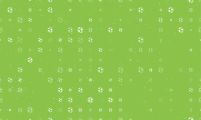 Seamless background pattern of evenly spaced white football symbols of different sizes and opacity. Vector illustration on light green background with stars