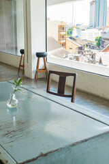 Empty Table and chair in Korean restaurant or minimal cafe style with view of city in seoul korea,cafe japan or korea concept.