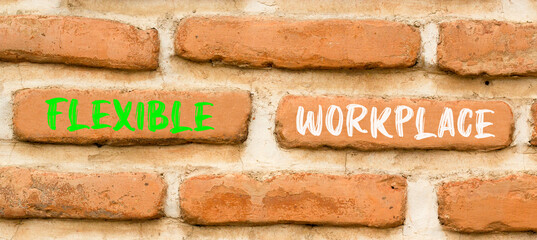 Flexible workplace symbol. Concept words Flexible workplace on beautiful brick wall. Beautiful red...
