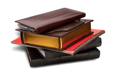 Stack of photo albums, business card holder and red spiral bound brochure isolated on a transparent background