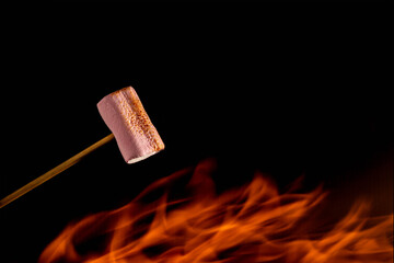 rich pink marshmallows with fire movements and with black background
