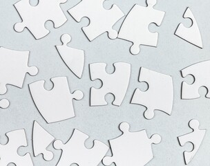 Jigsaw puzzle pieces connecting on abstract pattern background, business challenge solution concept