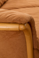 Vintage soft suede sofa. Mid-century modern couch. Photographed with luxurious long white curtains. 