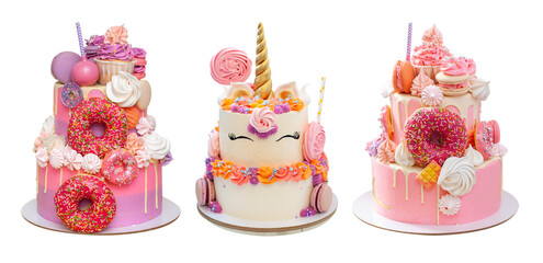 Elegant pink layered cakes for a girl or a woman. Isolated on white background with copy space for text. Decorated with donuts and unicorn