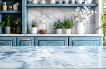 A sleek marble countertop is featured in a modern kitchen with stylish blue cabinets. The countertop is clean and well-maintained, providing a striking contrast against the bold blue cabinetry. 