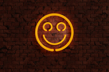 Yellow neon lights sign of smiley face on a red brick wall. Illustration of the concept of happiness, fun, joy and positive feeling