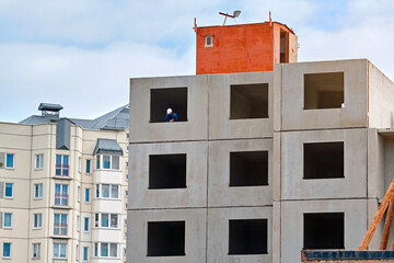 Construction of residential panel building. Construction of multi-storey residential buildings with...