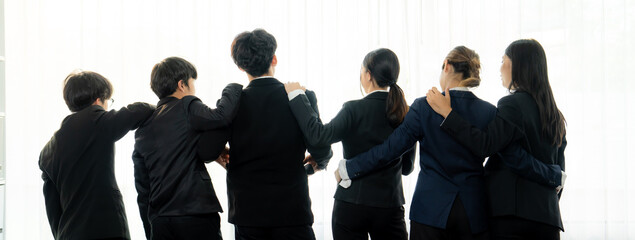 Panoramic banner back view of office worker team standing in line together with friendship posture...