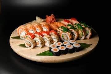Diverse sets featuring philadelphia salmon, tobiko, nori, and ginger-wasabi.