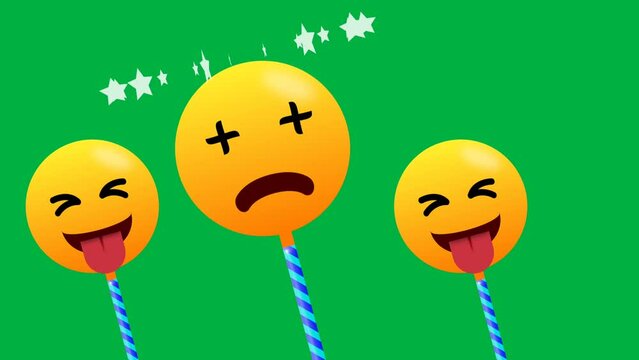 swinging emoji of star head and laughing expression on green screen