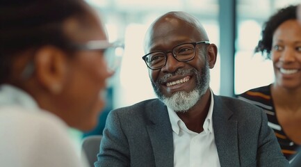 Fototapeta premium a happy group of business people having a conversation in an office, an african american businessman wearing glasses and a woman talking to each other. generative AI