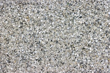 Background of plastered wall with small pebbles
