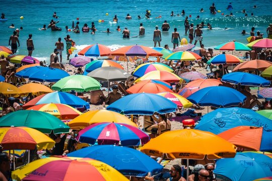 Large group of people gathered on the beach, relaxing under colorful umbrellas on a sunny day, A crowded beach dotted with colorful umbrellas and sunbathers