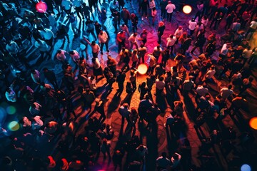 A large crowd of individuals standing closely together in a social gathering, A crowded dance floor with vibrant colors