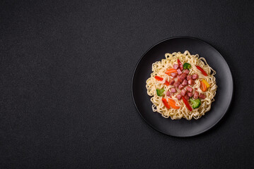 Delicious Asian dish rice noodles or udon with vegetables, spices and herbs