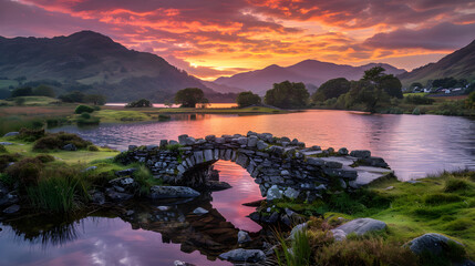 Tranquil Sunset Scenery in a UK National Park with Idyllic Hillside, Rustic Bridge & Reflective Water View