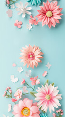 Paper flowers and butterflies arranged on a blue background.