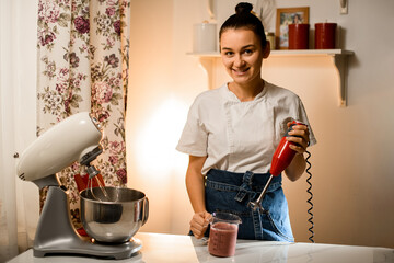 Making cream on a marble table by a culinary specialist with dark hair