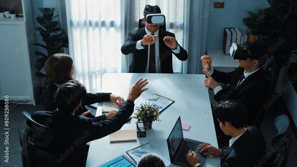 Poster top view of manager working on laptop and sending data analysis to business people by using vr glass