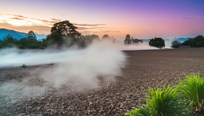 colorful mist pours above the ground in the middle of night - Powered by Adobe