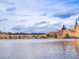 Obraz premium Prague panorama with is river and buildings. Capital of Czech, with Vltava river