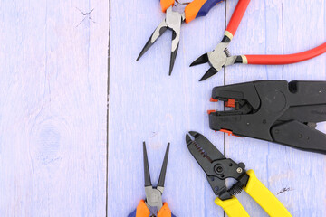 Electrical installation tools for work on the assembly of electrical equipment. Close-up.