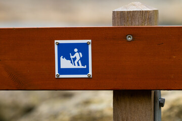 Sign marking a hiking path.