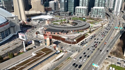 Naklejka premium Street traffic in Toronto Canada aerial view from above - TORONTO, CANADA - APRIL 17, 2024