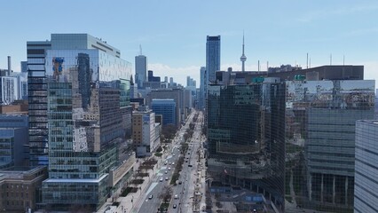 Naklejka premium Flight over the city of Toronto Canada aerial view - TORONTO, CANADA - APRIL 17, 2024