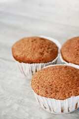 Close up of freshly baked cupcakes on the table.