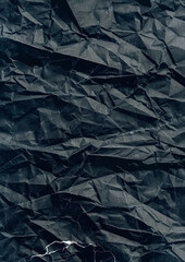 crinkled black paper texture, creases and folds pattern, worn