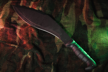 Large tactical kukri knife, close-up photo.