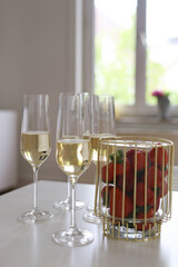  glasses of champagne with strawberries