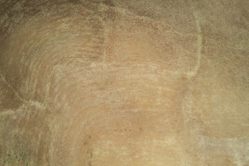Brown plowed ground soil