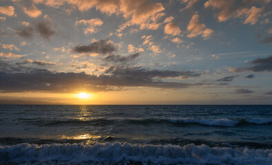 Obraz premium Sunset on the shores of the Mediterranean Sea. Cyprus