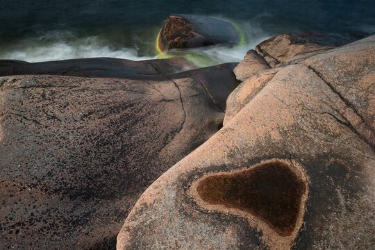 Red granite, rocky coast, surf, long exposure, Havsvidden, Geta, Aland, Aland Islands, Finland, Europe