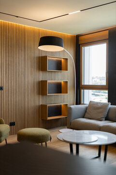 Modern wooden shelves in luxury apartment interior