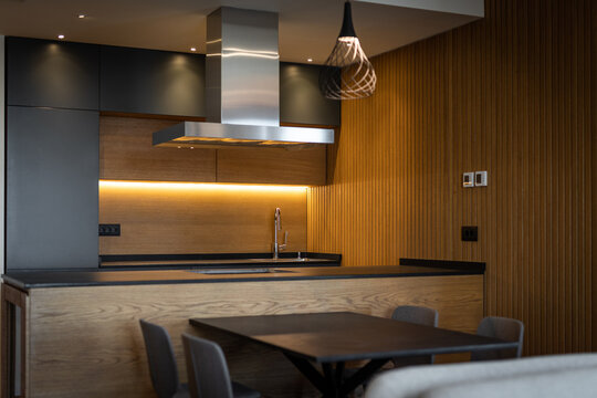 Interior of a luxury kitchen with dining table and chairs