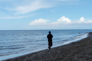 Contemplating Nature: A Solo Stroll at Tulamben Beach Bali