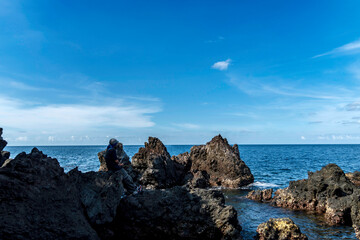 Rock and Blue Sea at Tulamben Beach Bali 