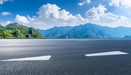 asphalt highway road and mountains with sky clouds background