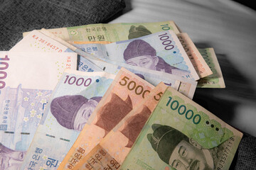 South Korea won bills on bed 
