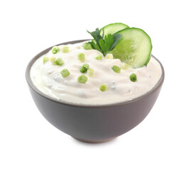 Delicious yogurt with green onion, cucumbers and parsley in bowl isolated on white