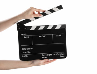Woman holding movie clapper on white background, closeup