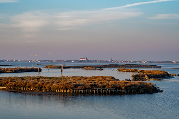 Regional Park of Po River Delta. The valleys and the small town of Comacchio on a bright winter...